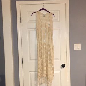 •Pretty cream lace overlay•